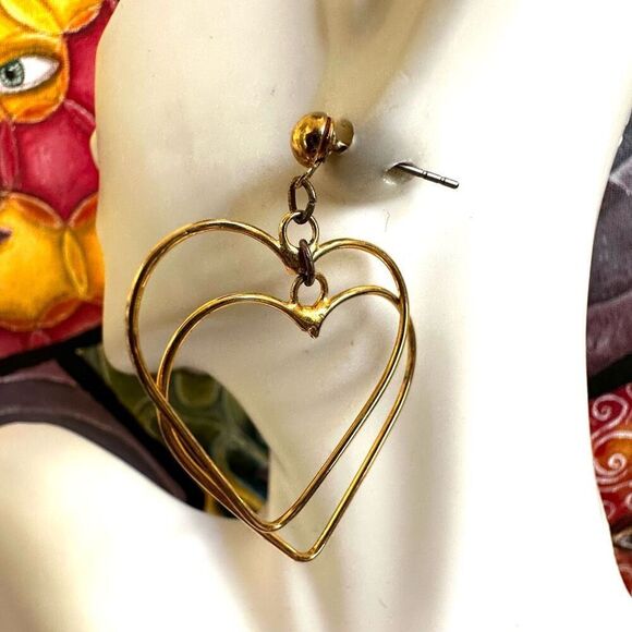 Gold tone double heart dangling earrings - Picture 3 of 4
